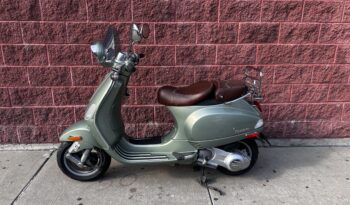 
									2009 Vespa LXV 150 full								